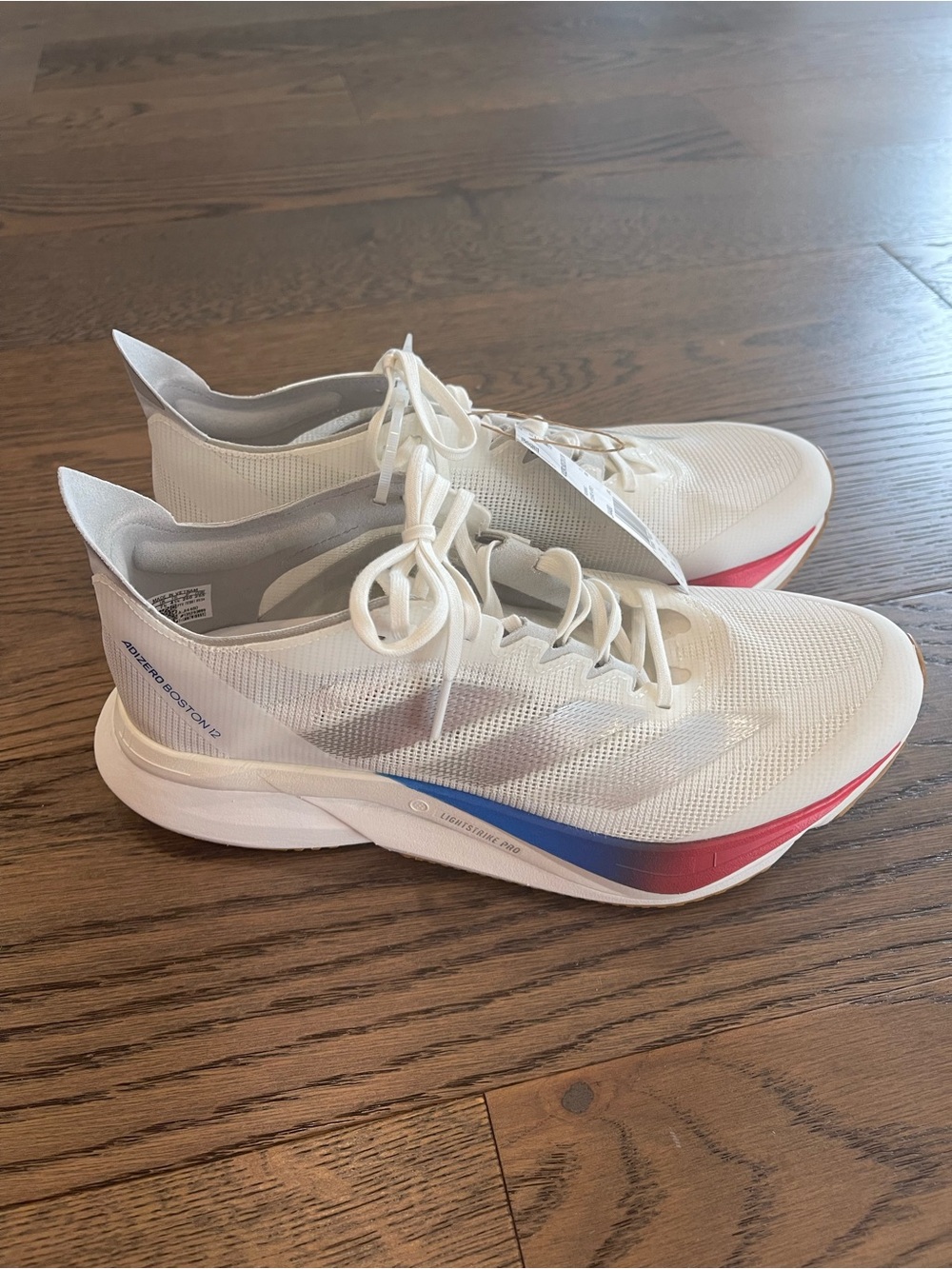 adidas White Athletic Running Shoes with Blue and Red Accent
